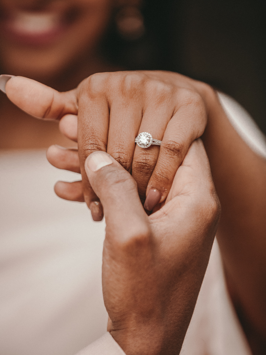 Woman smiling with engagement ring